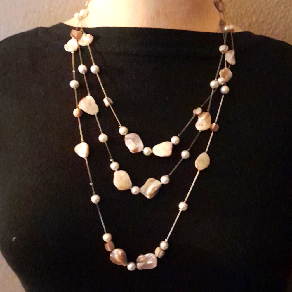 Seashell and silver tone necklace